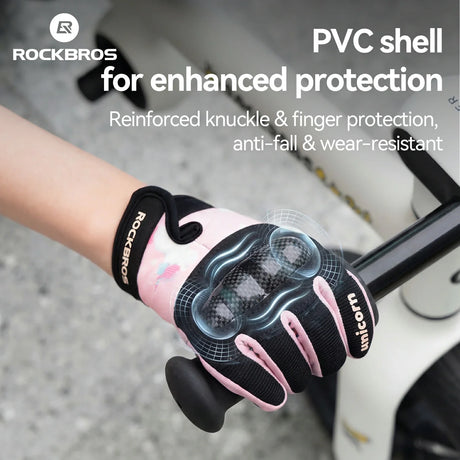 Pink and black glove with 'RockBros' branding on a blurred background